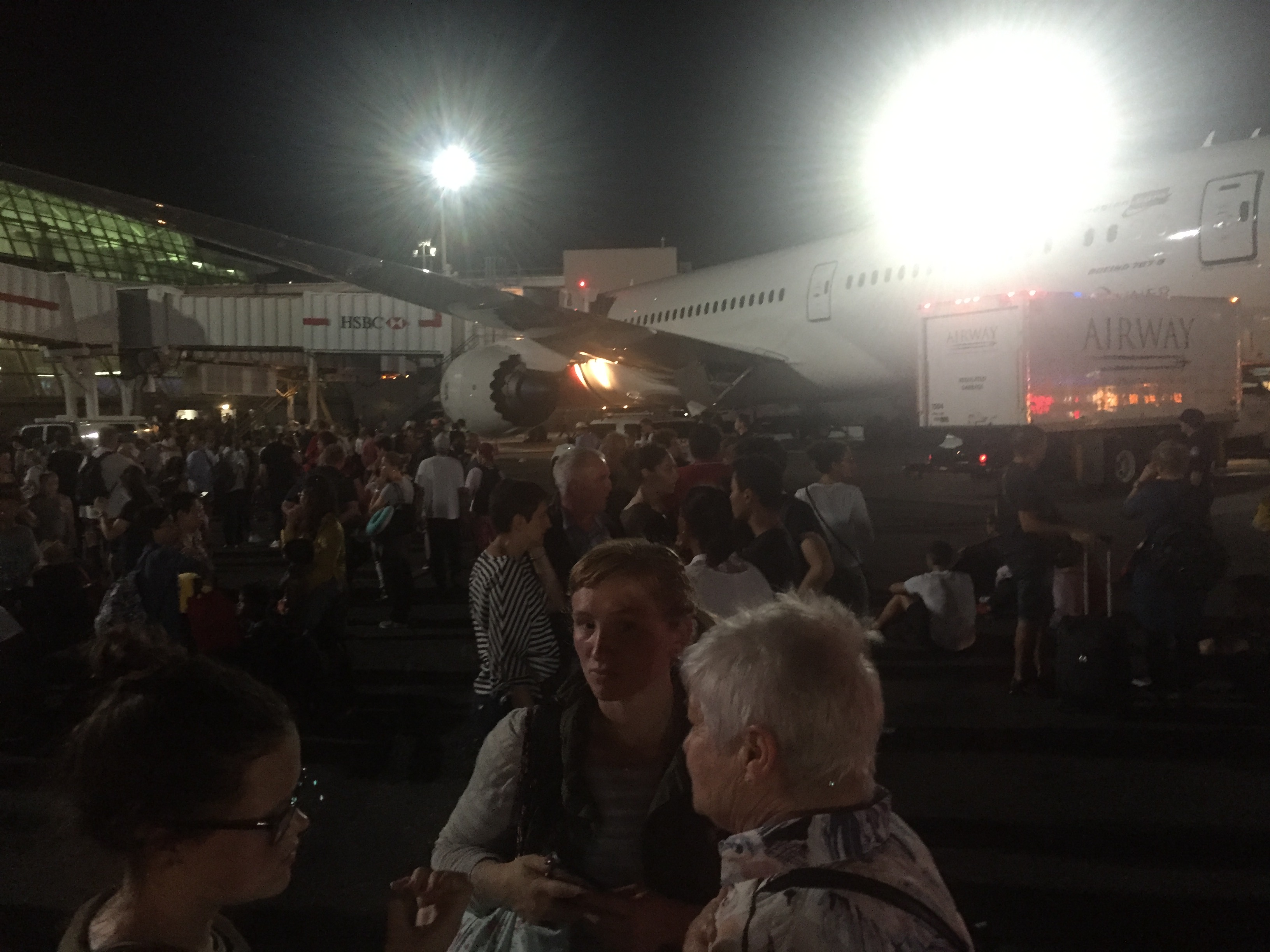 Gathering crowd on tarmac